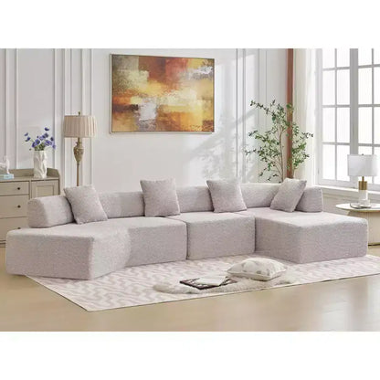Divano componibile a L moderno da 355 cm con 4 posti, rivestimento in tessuto Boucle, 4 cuscini decorativi, nessun montaggio richiesto