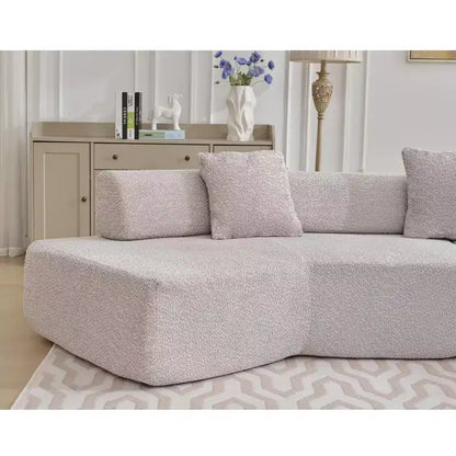 Divano componibile a L moderno da 355 cm con 4 posti, rivestimento in tessuto Boucle, 4 cuscini decorativi, nessun montaggio richiesto
