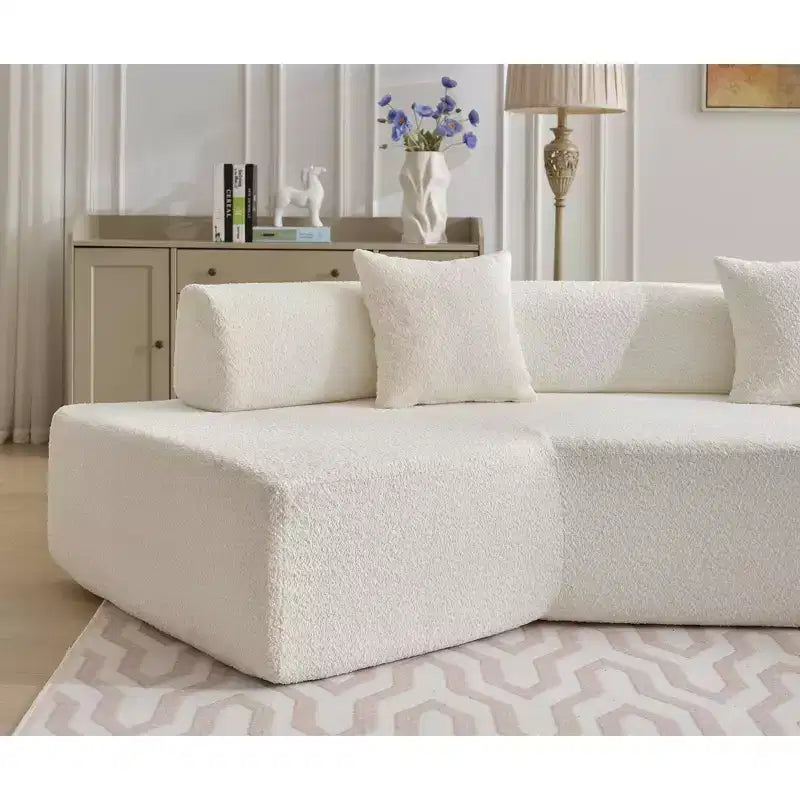 Divano componibile a L moderno da 355 cm con 4 posti, rivestimento in tessuto Boucle, 4 cuscini decorativi, nessun montaggio richiesto