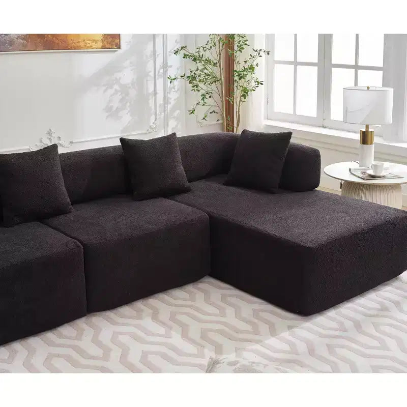 Divano componibile a L moderno da 355 cm con 4 posti, rivestimento in tessuto Boucle, 4 cuscini decorativi, nessun montaggio richiesto